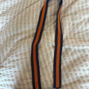 Orange and navy purse strap Gold details